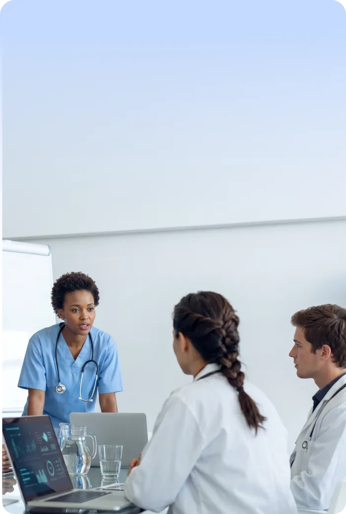 Healthcare professionals collaborating on program design